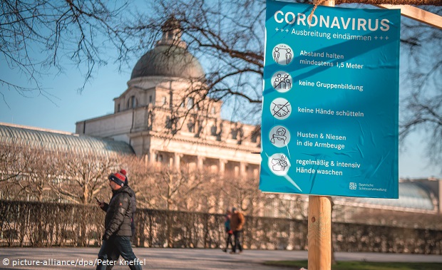 A warning sign, reminding Germans to stick to social distancing rules