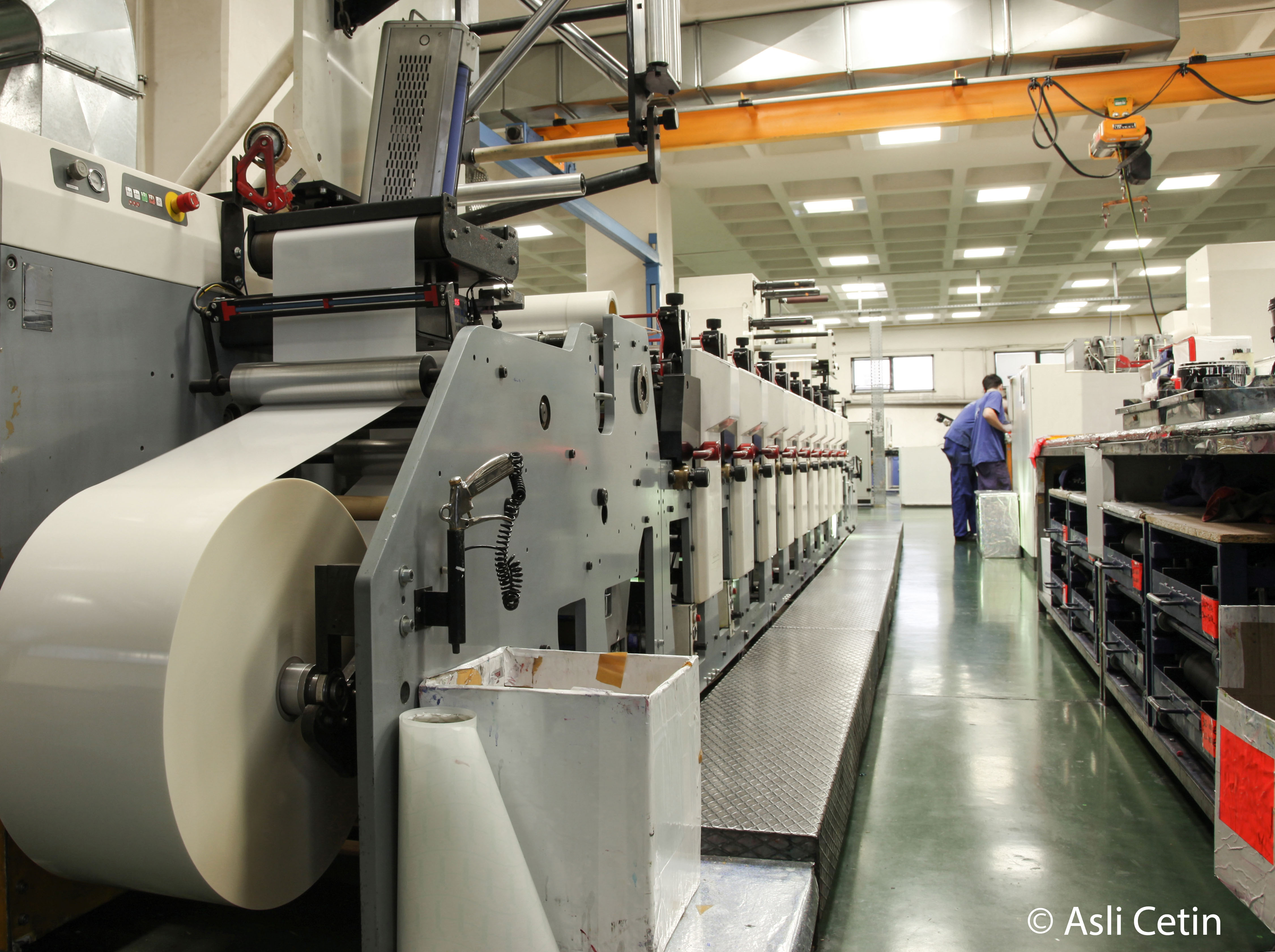 Pressmen and an industrial printer