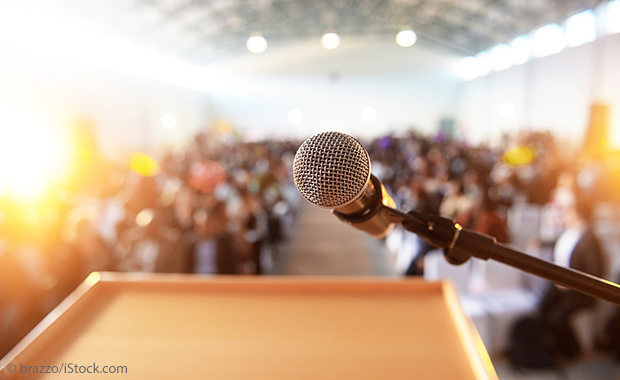 Presentation situation: looking at a microphone and an audience