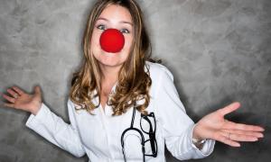 a female doctor with a clown’s nose on