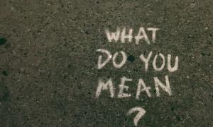 "What do you mean?" sprayed on the tarmac