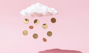 coins falling out of a cloud against a pink background