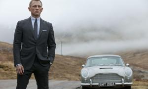 James Bond next to his car
