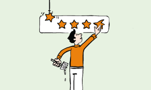 a man putting up a star on a rating display