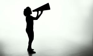 woman shouting into megaphone