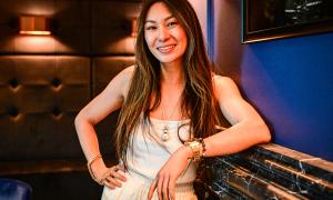 Lucy Guo poses for the camera