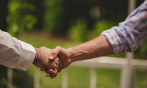 two people shaking hands