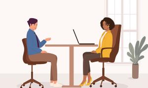 Black Woman Manager Interviewing A Male Candidate At Office.