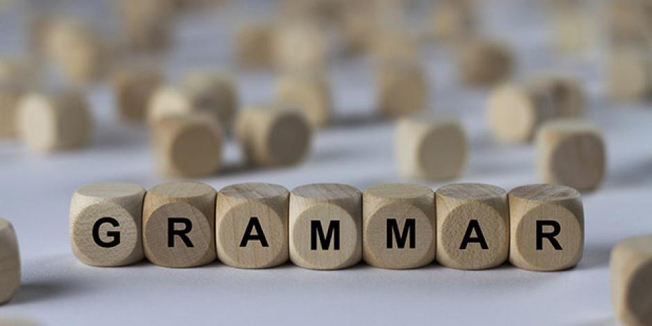 Würfel formen das englische Wort für Grammatik: Grammar