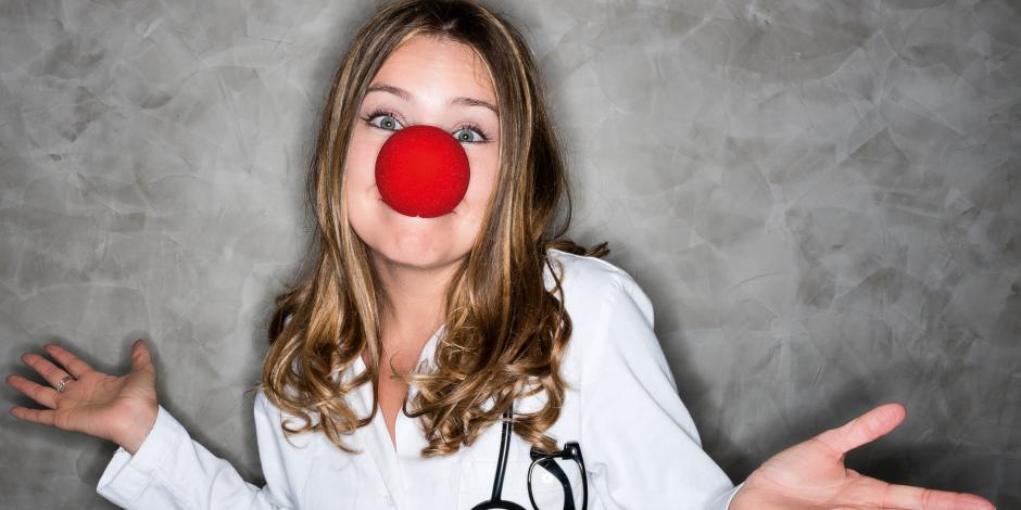 a female doctor with a clown’s nose on