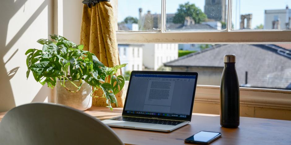 A laptop on a desk at home