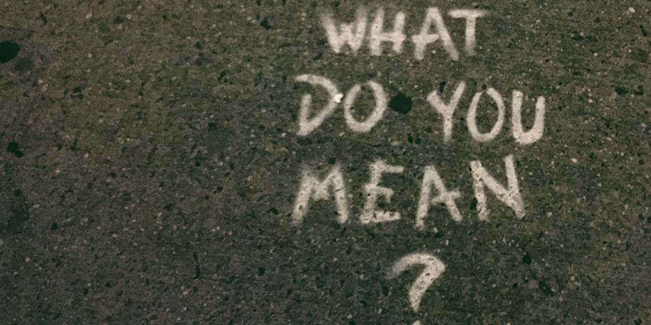 "What do you mean?" sprayed on the tarmac