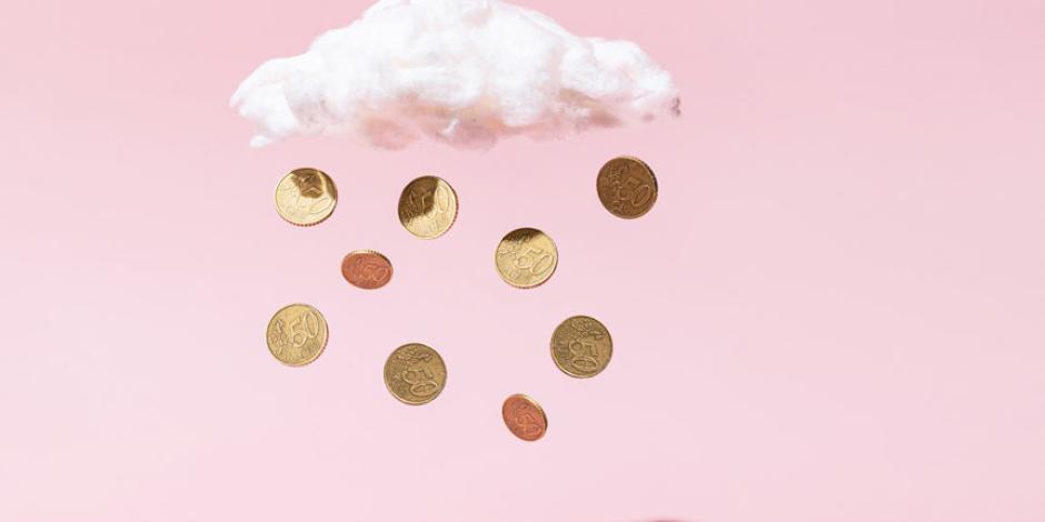 coins falling out of a cloud against a pink background
