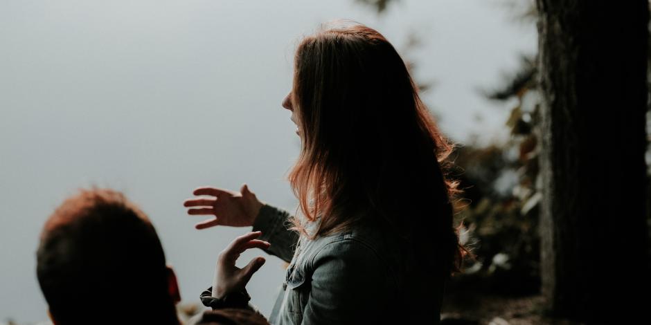 woman speaking outside