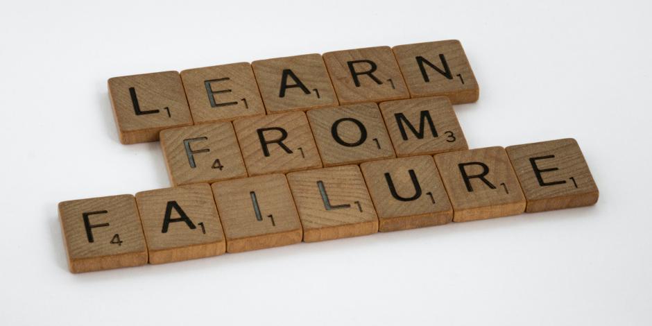 "Learn from failure" spelled out using Scrabble tiles