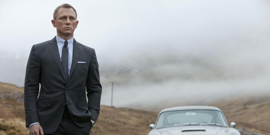 James Bond next to his car