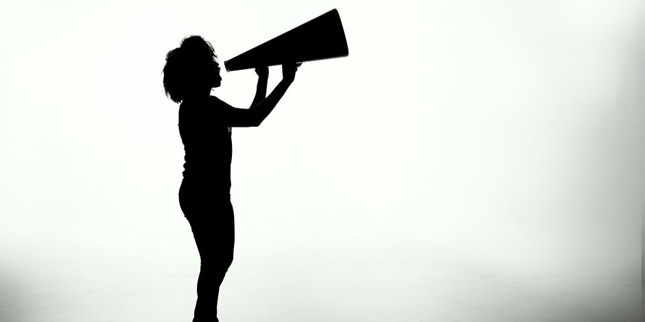 woman shouting into megaphone