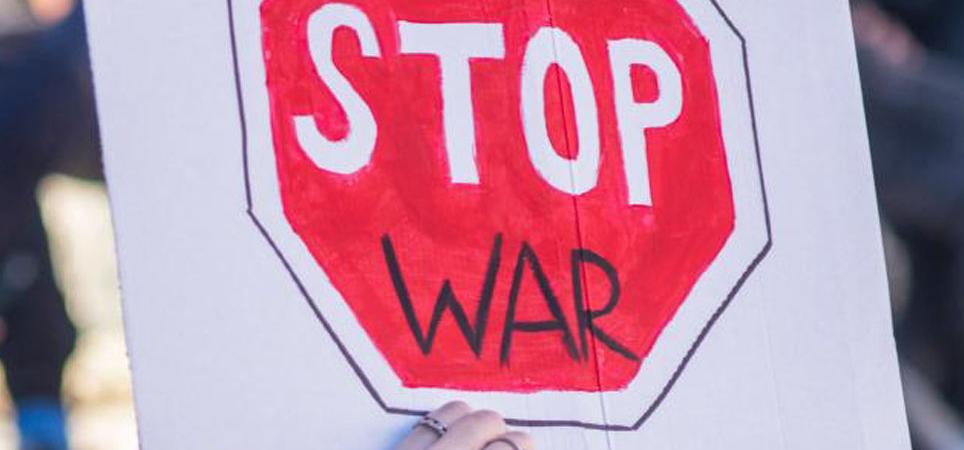 Sign that says "stop war"