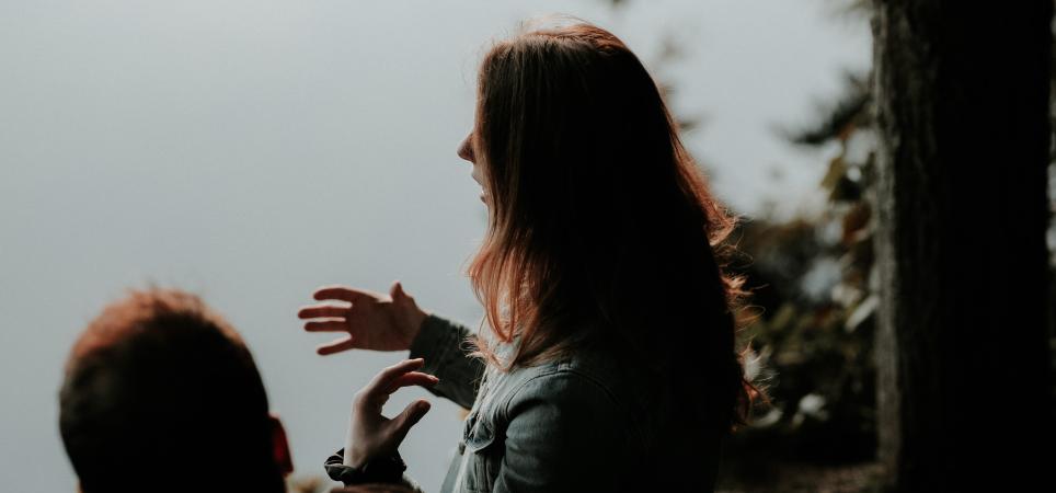 woman speaking outside