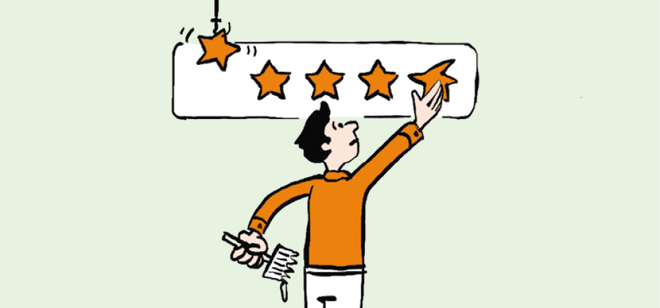 a man putting up a star on a rating display