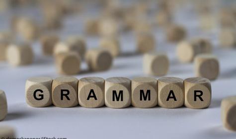 Würfel formen das englische Wort für Grammatik: Grammar