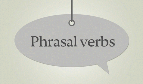 Schild mit Aufschrift "Phrasal verbs"