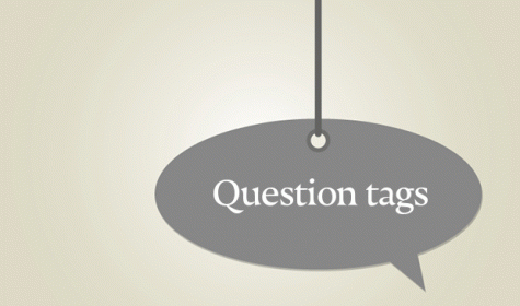 Schild mit Aufschrift "Question tags"