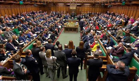 Britain's Prime Minister Theresa May addresses the House of Commons on her government's reaction to the poisoning of former Russian intelligence officer Sergei Skripal and his daughter Yulia in Salisbury, in London,
