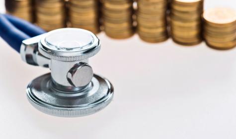 stethoscope and coins