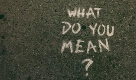 "What do you mean?" sprayed on the tarmac