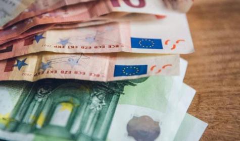 Euro bills in an envelope