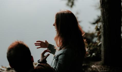 woman speaking outside