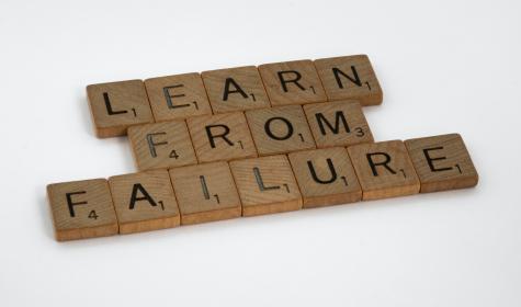 "Learn from failure" spelled out using Scrabble tiles