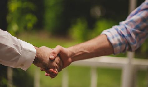 two people shaking hands