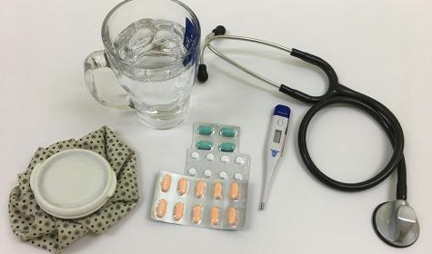 A table full of typical items used by those that are ill
